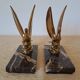 Pair of golden bird bookends on veined marble – Mid-Century vintage