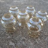 Set of 6 amber glass globes.