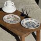 Assiette ancienne en faïence à décor de paysage bleu D24,5