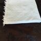 White woven cotton bedspread with fringes