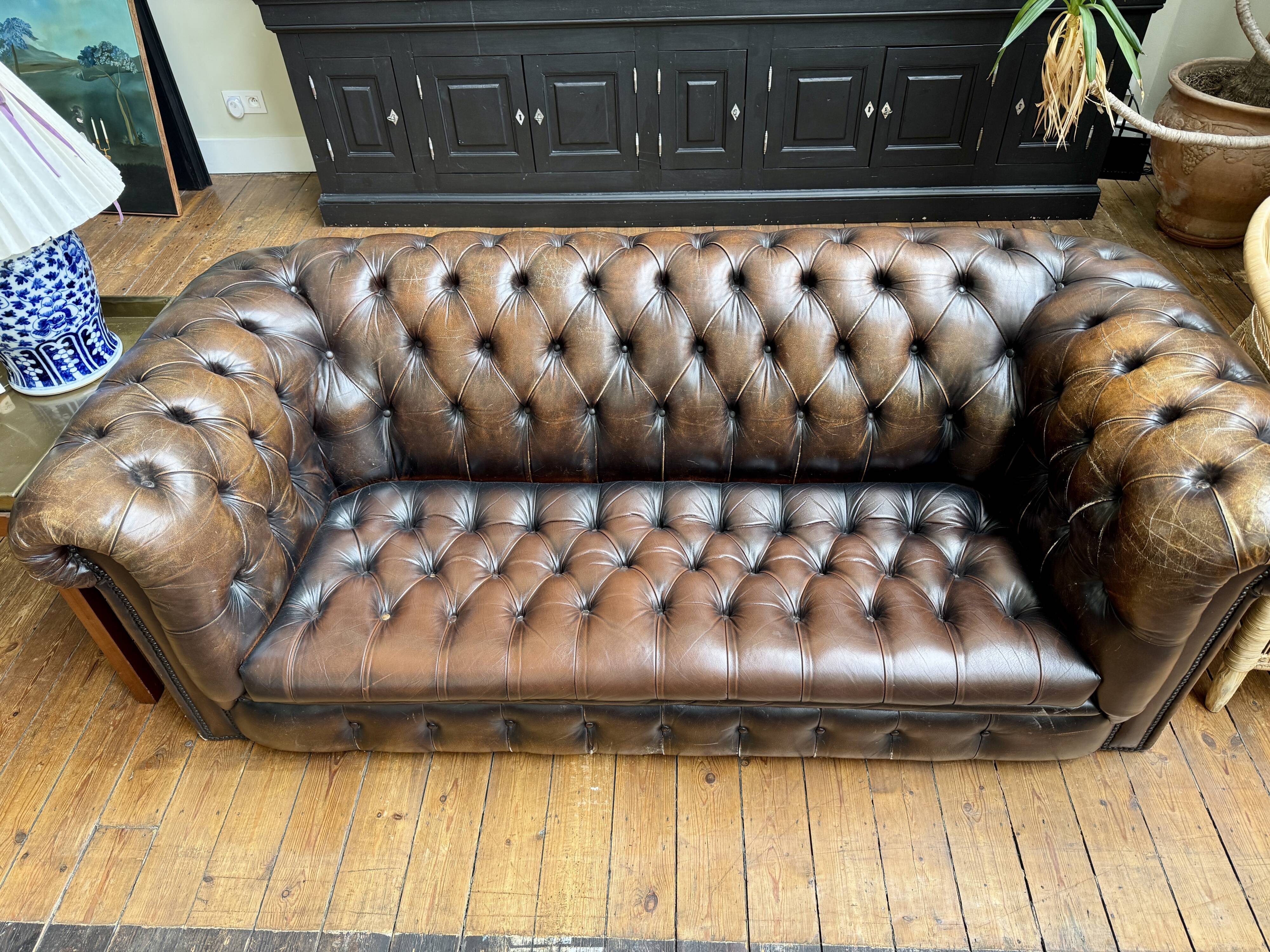 Chesterfield leather sofa in Art Deco style