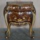 Pair of curved walnut commodes with marquetry and marble tops.