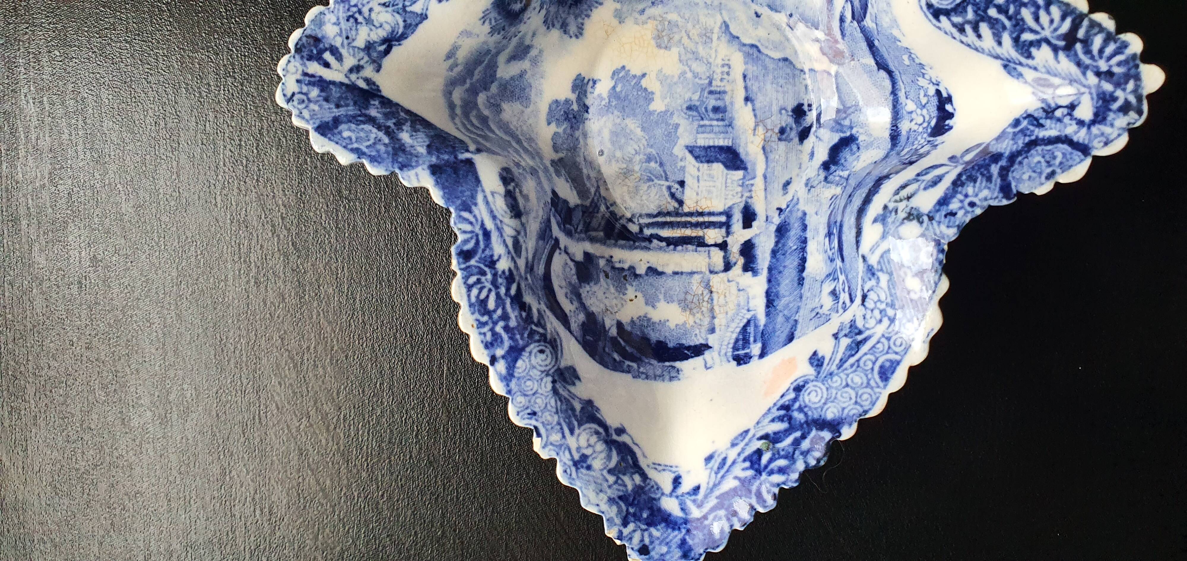 Copeland pickle dish in the shape of a leaf in blue earthenware.