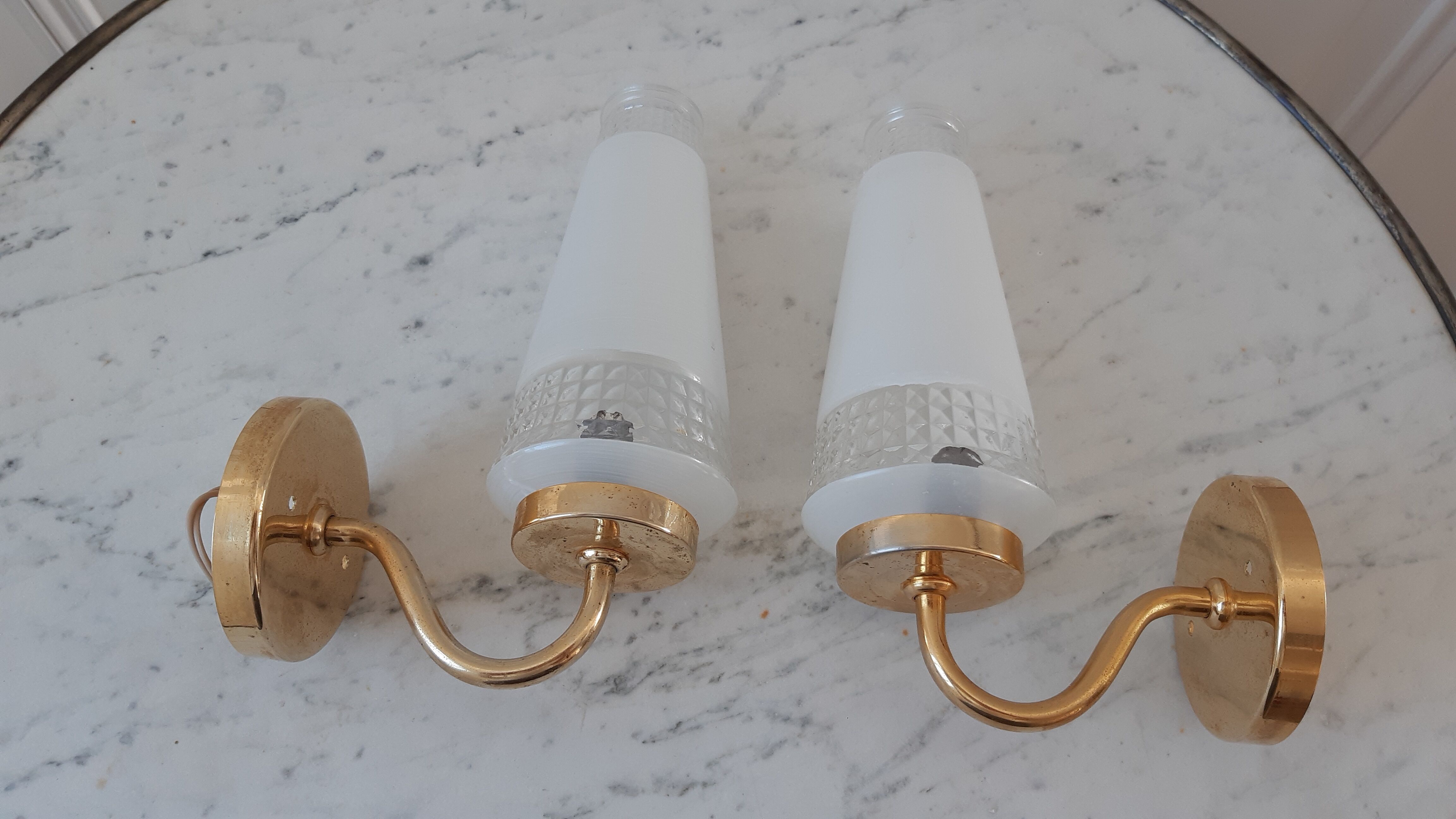 Pair of glass and gilded metal sconces 50s