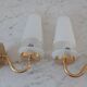 Pair of glass and gilded metal sconces 50s