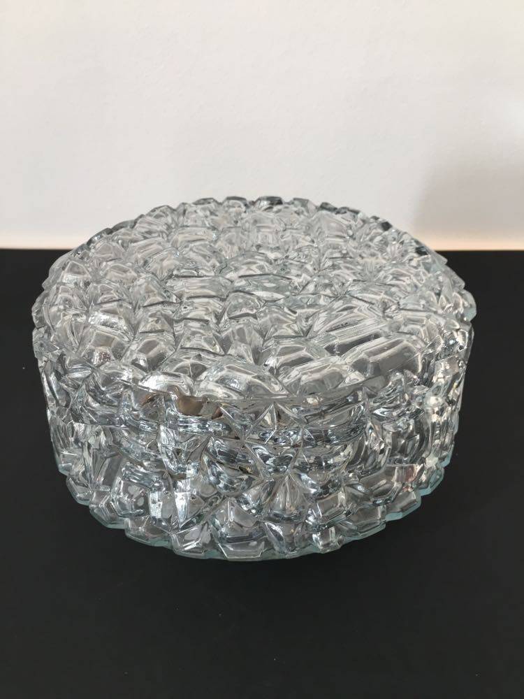 Round ceiling or wall lamp in worked glass. Gray metal support