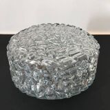 Round ceiling or wall lamp in worked glass. Gray metal support