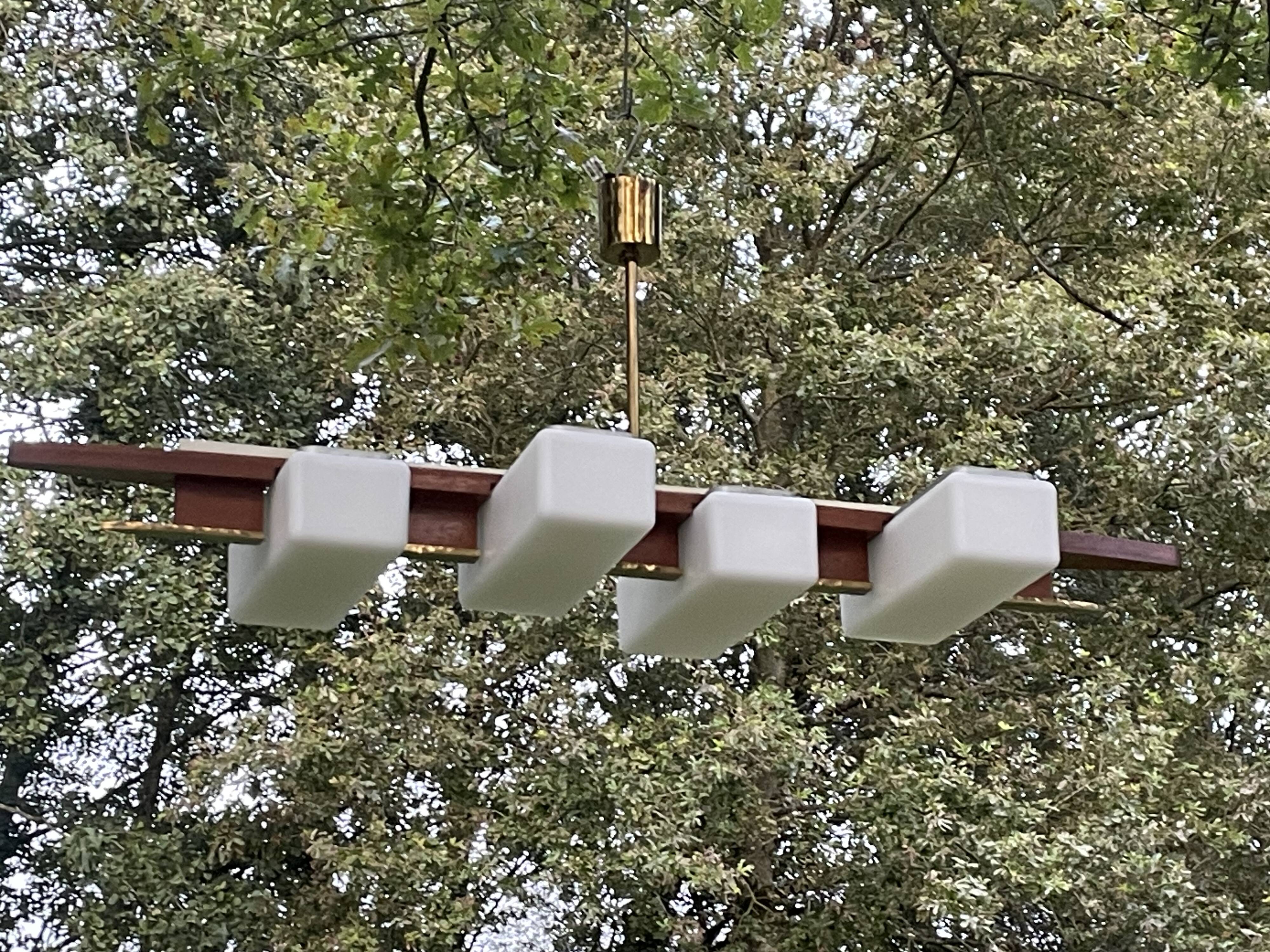 Scandinavian chandelier, brass, precious wood, 4 lights, shuttle 102 x 35 x 9 cm