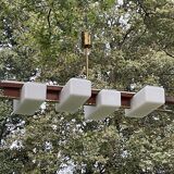 Scandinavian chandelier, brass, precious wood, 4 lights, shuttle 102 x 35 x 9 cm