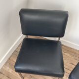 Black leather armchairs