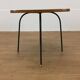 Modernist side table, 1950s, wood and metal, with handles.