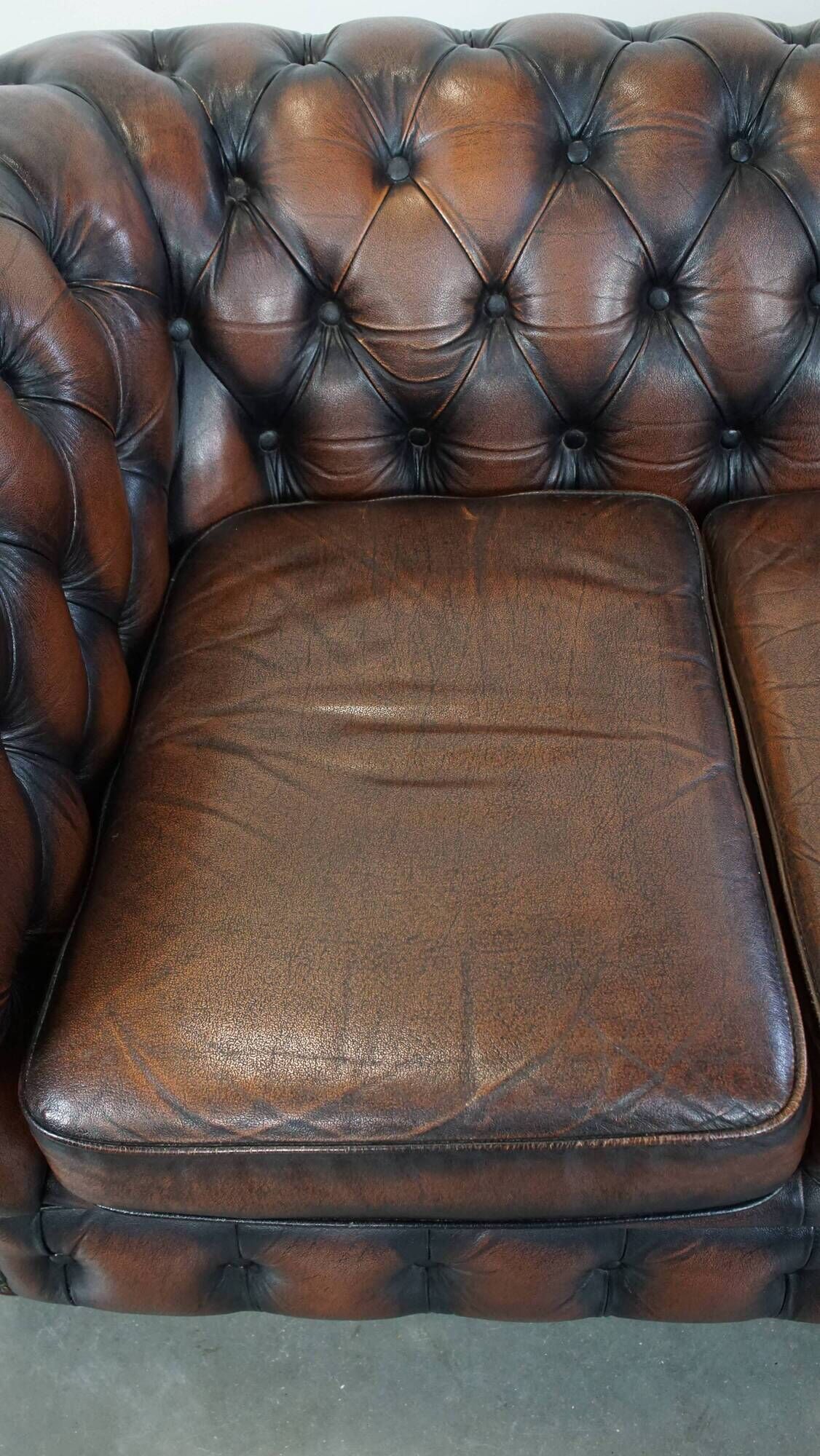 Classic English Chesterfield 2.5 seater sofa in brown cowhide