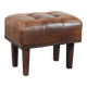Beautiful sheepskin ottoman on high legs and beautiful warm colours