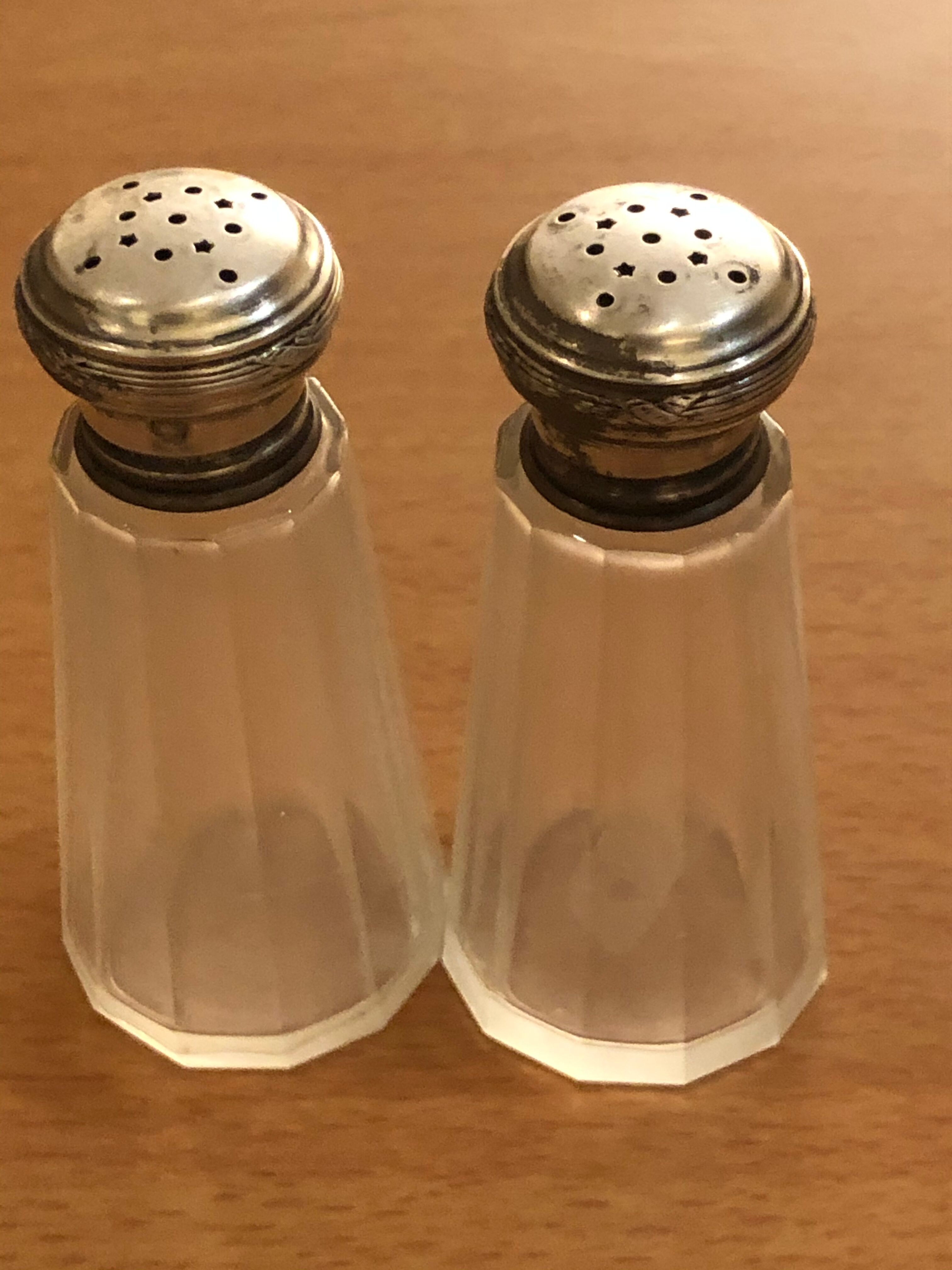 Saliere and pepper in solid silver cap