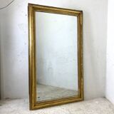 19th century mercury mirror with wooden frame and gilded stucco
