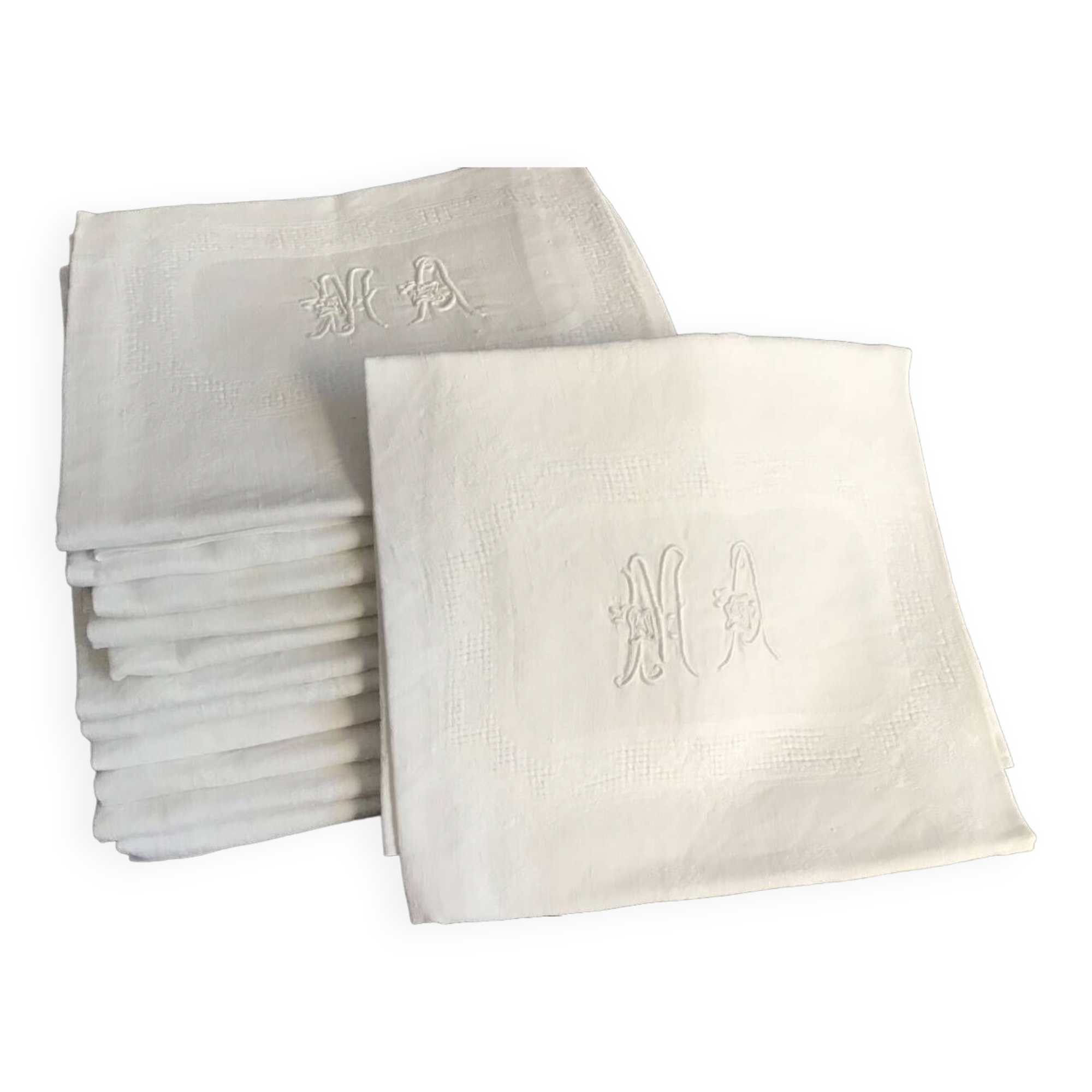 Damask napkins embroidered with an MA monogram