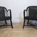 Paire de fauteuils noirs en rotin