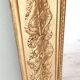 Wood and gilded stucco mirror, 19th century, 115 x 61.5 cm.