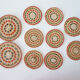 Set of coasters and bottles in colored wicker