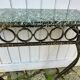 Console in wrought and hammered iron and green marble
