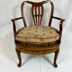 Fauteuil bas anglais en bois ajouré à assise cannée, 19e siècle