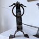 Paire de chenets zoomorphes métal « chiens » 1950