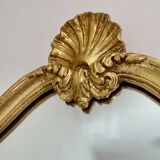 Miroir doré de style baroque Louis XV