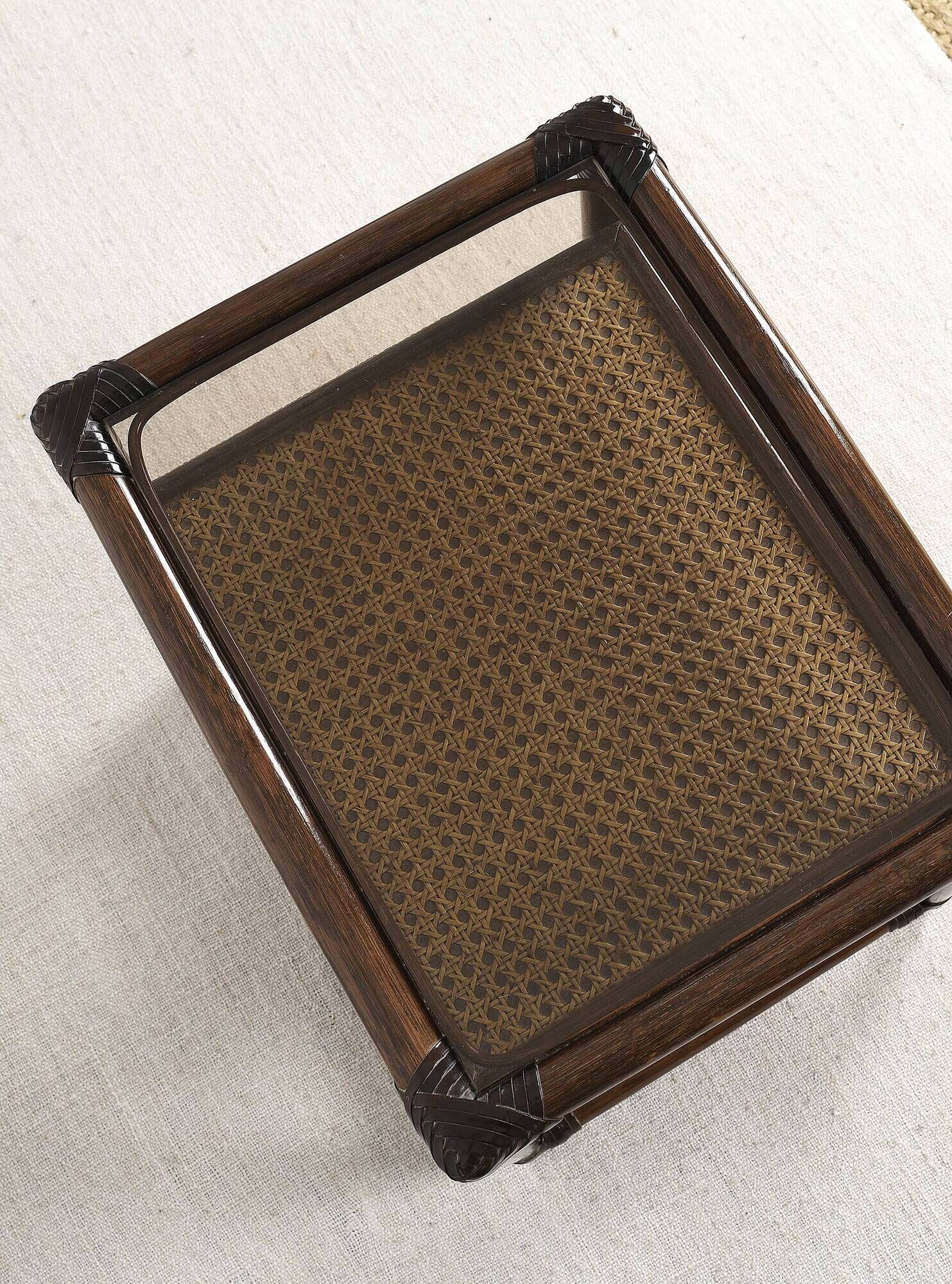 Rattan and cane bedside table, smoked glass top