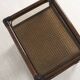 Rattan and cane bedside table, smoked glass top