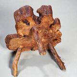 Olive root coffee table in brutalist style.