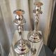 Pair of candle holders in sober and elegant silver metal