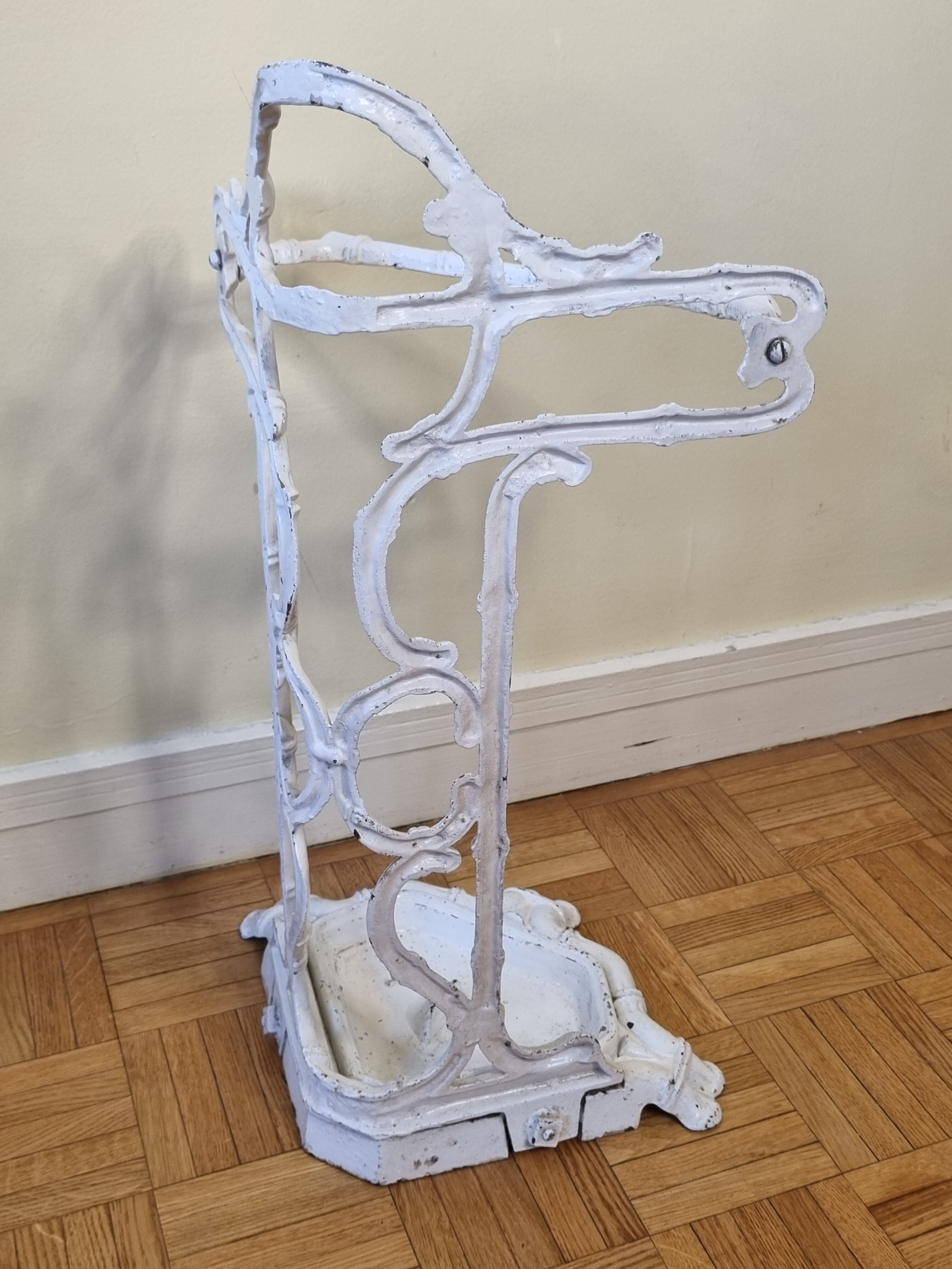 Old Victorian umbrella stand, late nineteenth century in white lacquered cast iron