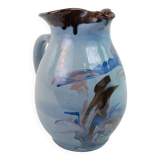 Large blue pitcher with abstract pattern