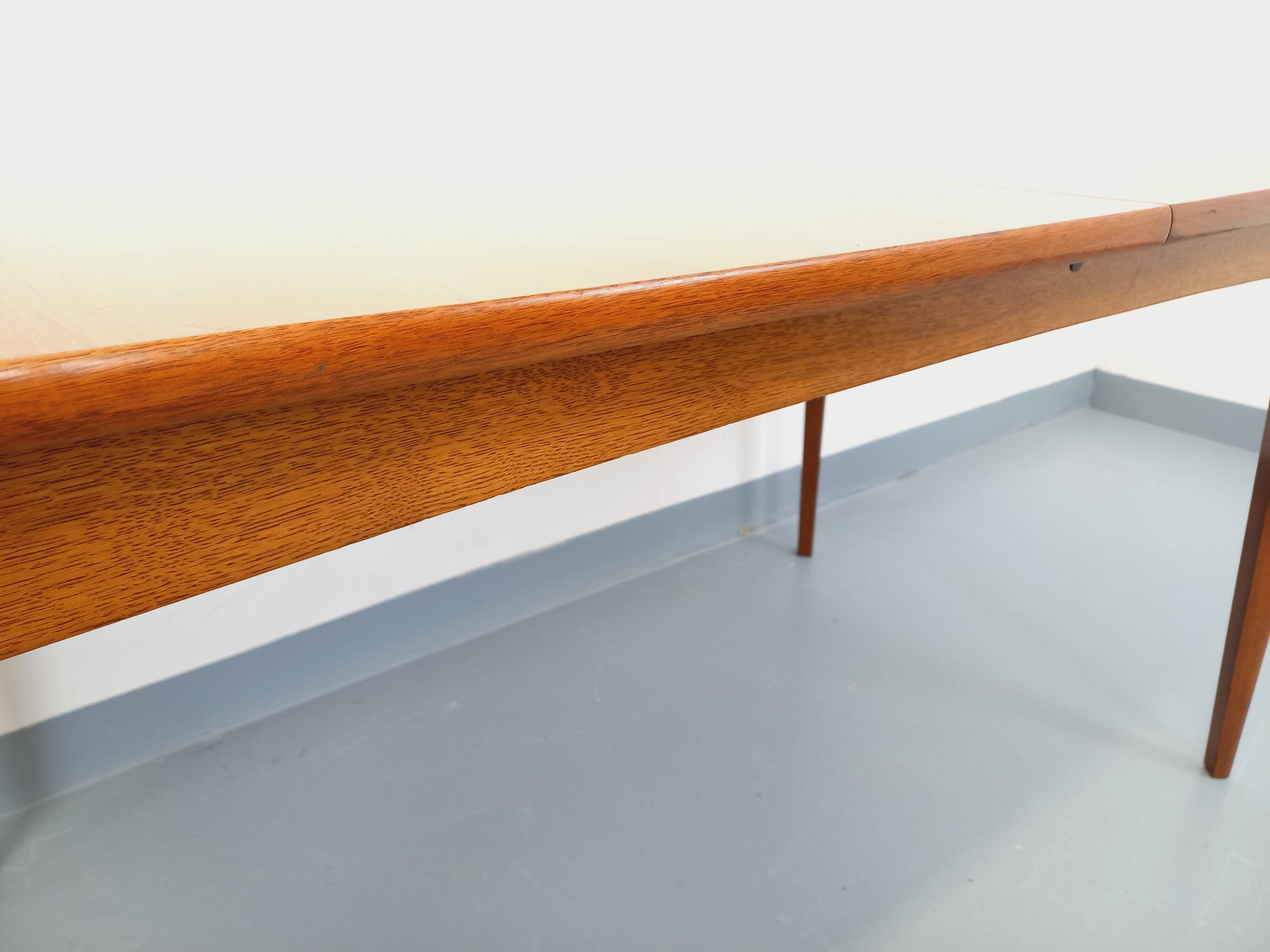 Rectangular dining table in vintage Scandinavian style from the 50s and 60s, made of teak.