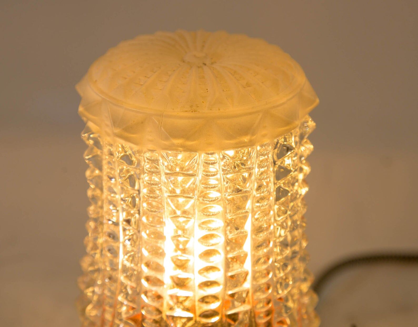 Built-in glass dome and vintage round orange base from the 70s