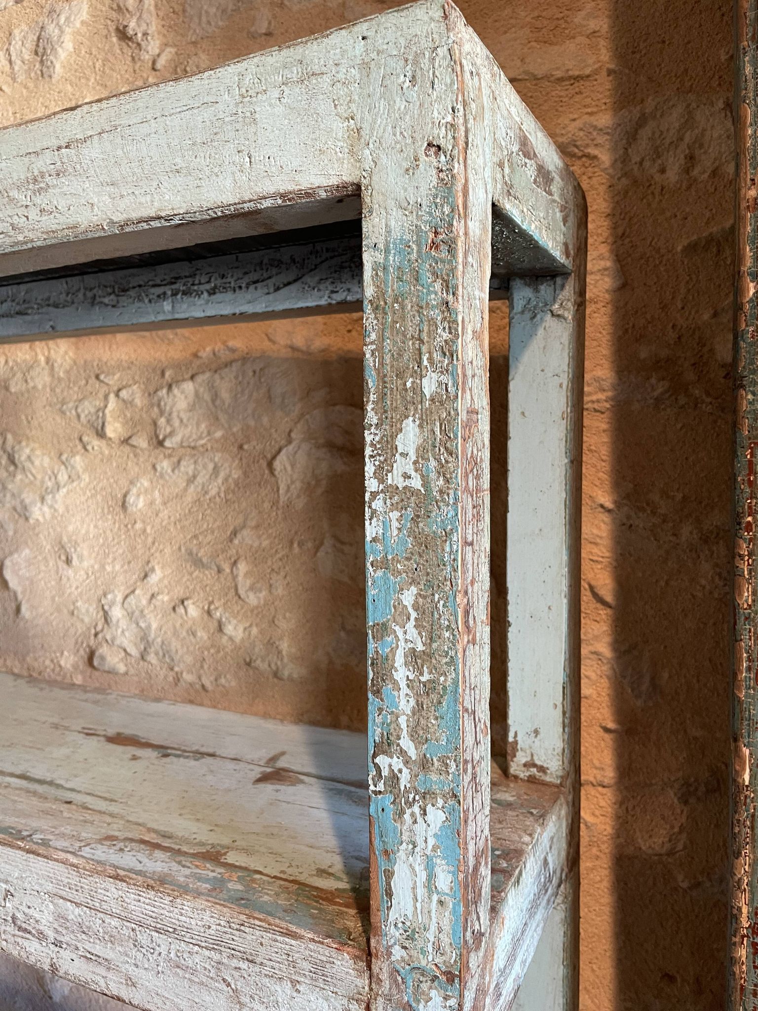 Blue lacquered teak shelves
