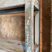 Blue lacquered teak shelves