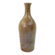 Brown ceramic/stoneware bottle with chiseled floral pattern