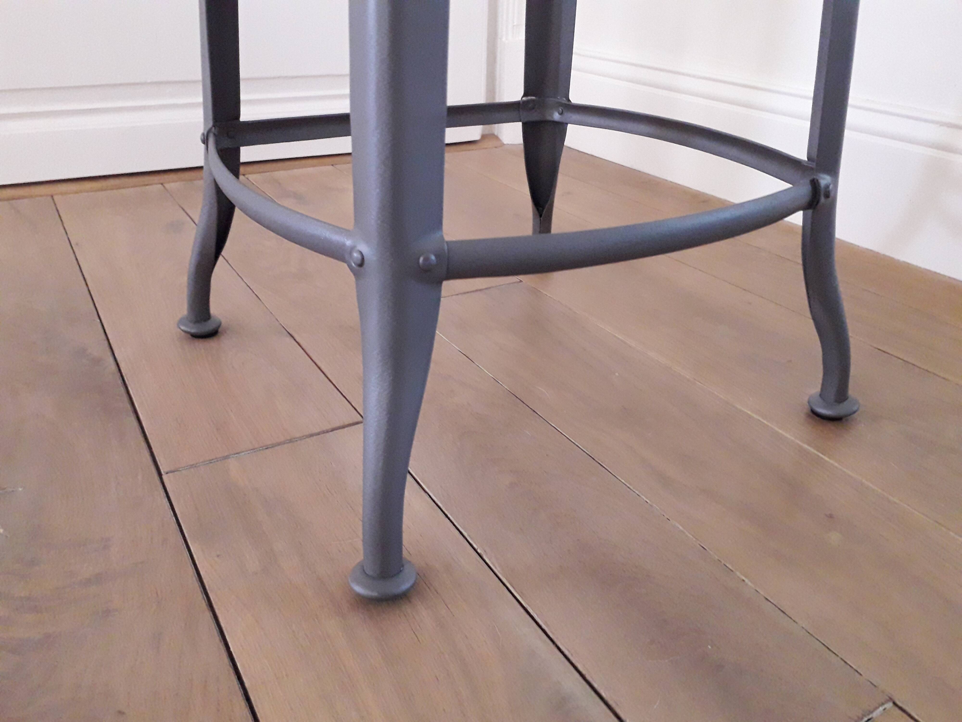 Industrial stool in crude steel