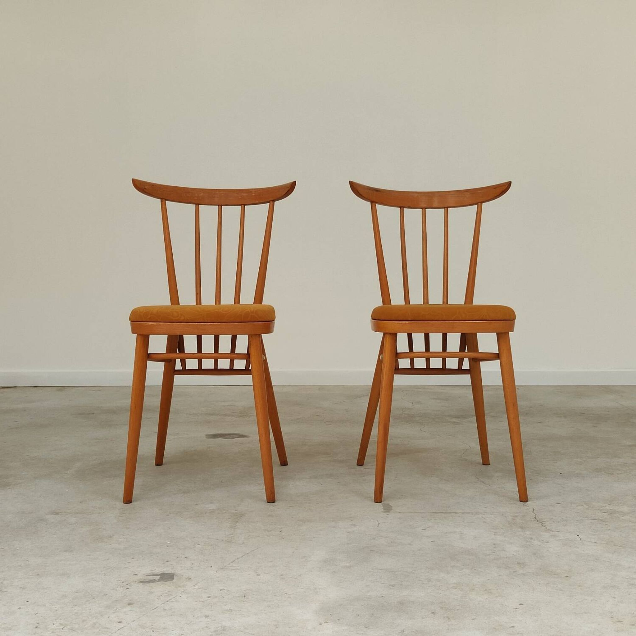 Pair of wooden dining room chairs by Tatra Pravenec 1960