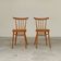 Pair of wooden dining room chairs by Tatra Pravenec 1960