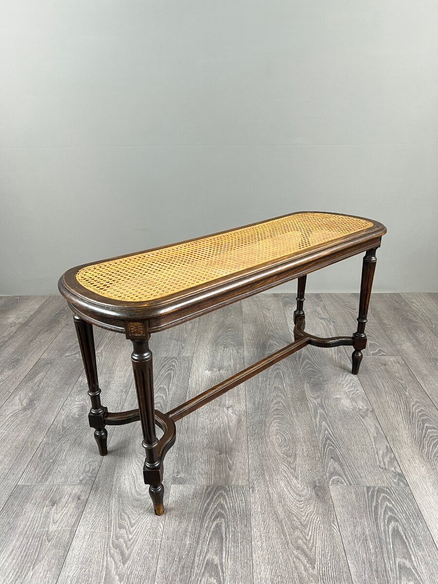 Antique wooden bench, caned seat, Louis XVI style, 20th century.