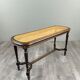 Antique wooden bench, caned seat, Louis XVI style, 20th century.