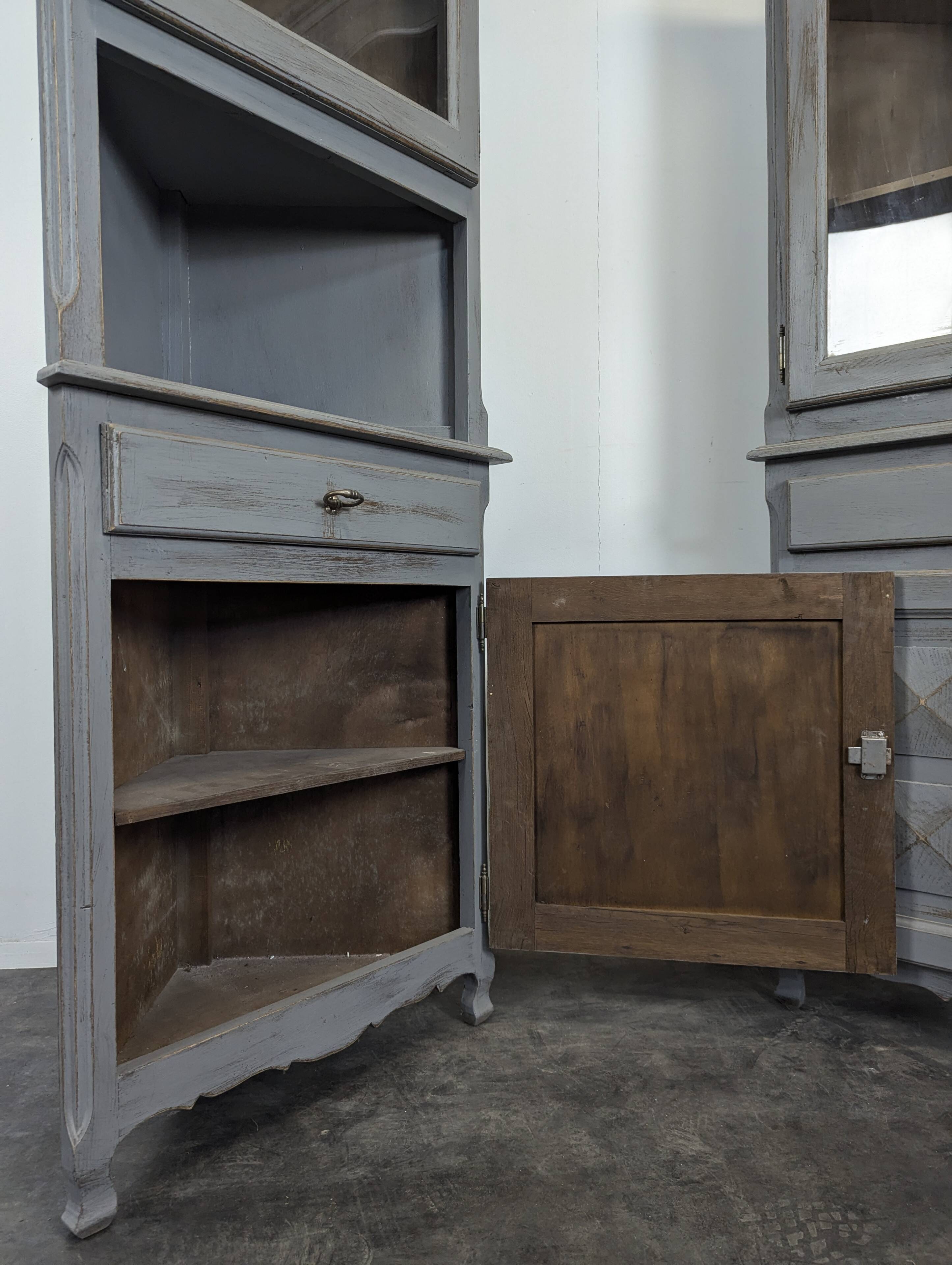Pair of re-edged corner cabinets