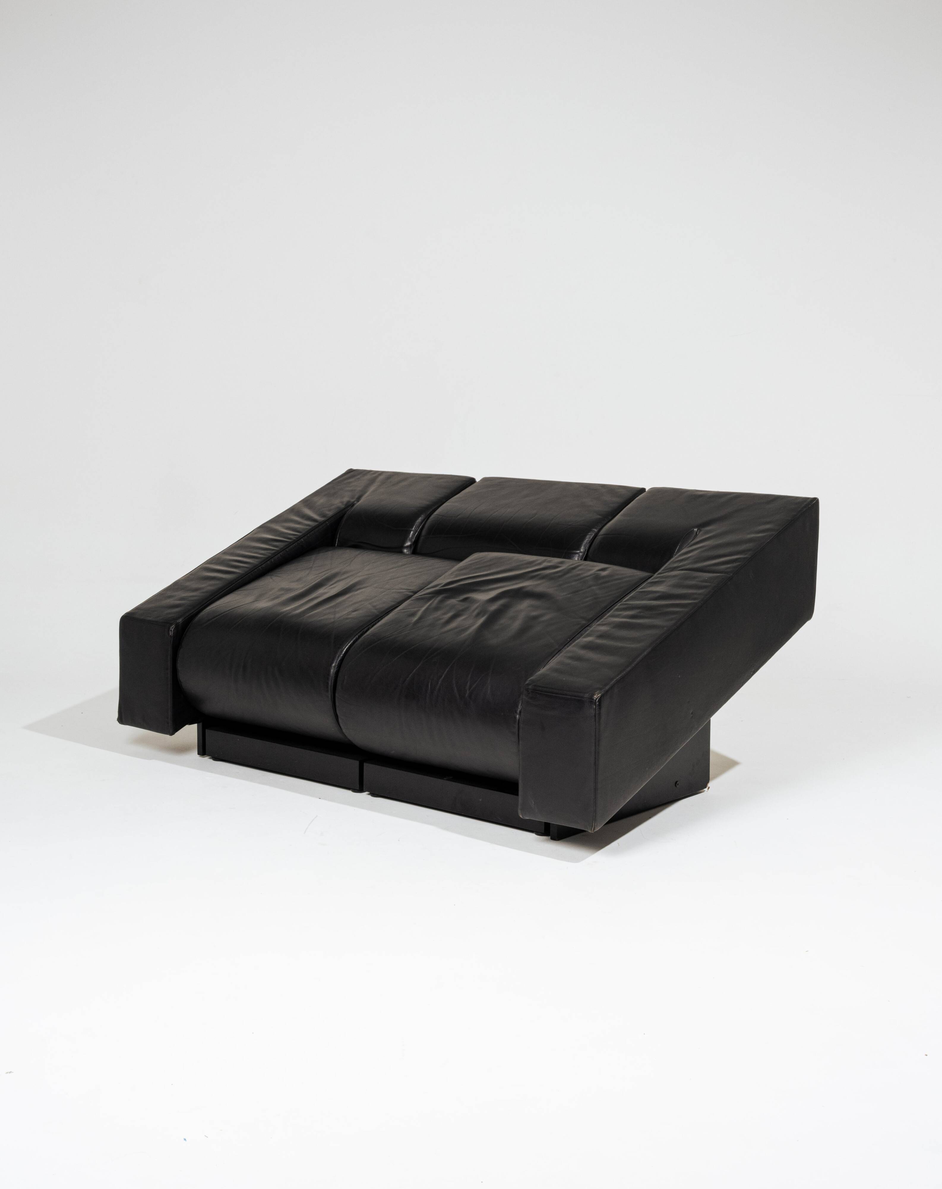 Obliqua two-seater leather sofa, Mario Botta, 1980s