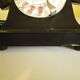 Black bakelite phone with earphone