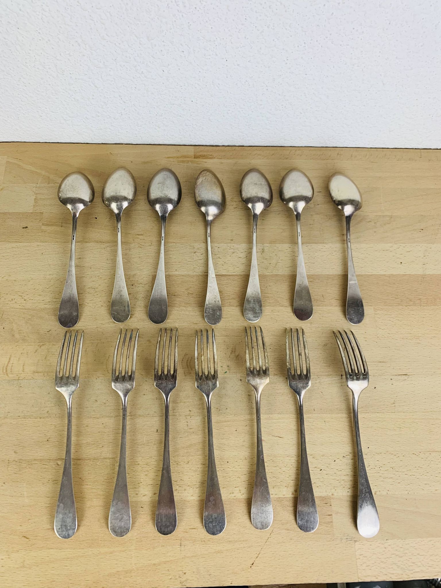 7 vintage silver plated forks and 7 spoons