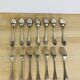 7 vintage silver plated forks and 7 spoons