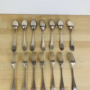 7 vintage silver plated forks and 7 spoons