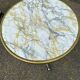 Round bistro table with a central pedestal, gold marble effect and black steel, 60cm.